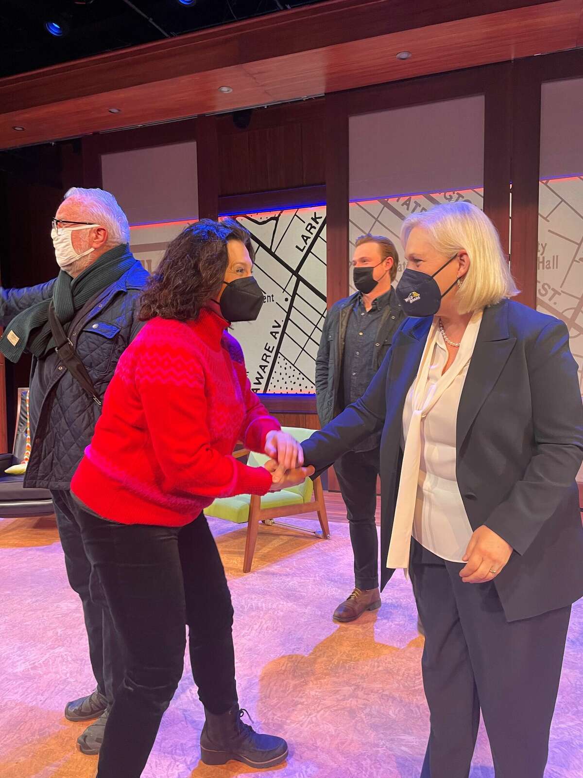 Antoinette LaVecchia, left, greets Sen. Kirsten Gillibrand with other members of the cast of the play “The True” on the stage of Capital Repertory Theatre in Albany following the April 9, 2022, matinee performance. Set in 1977, the play focuses on longtime Albany Mayor Erastus Corning 2nd and his most trusted aide, Polly Noonan. Gillibrand is Noonan’s granddaughter, and LaVecchia plays Noonan. “The True” runs through April 24. 
