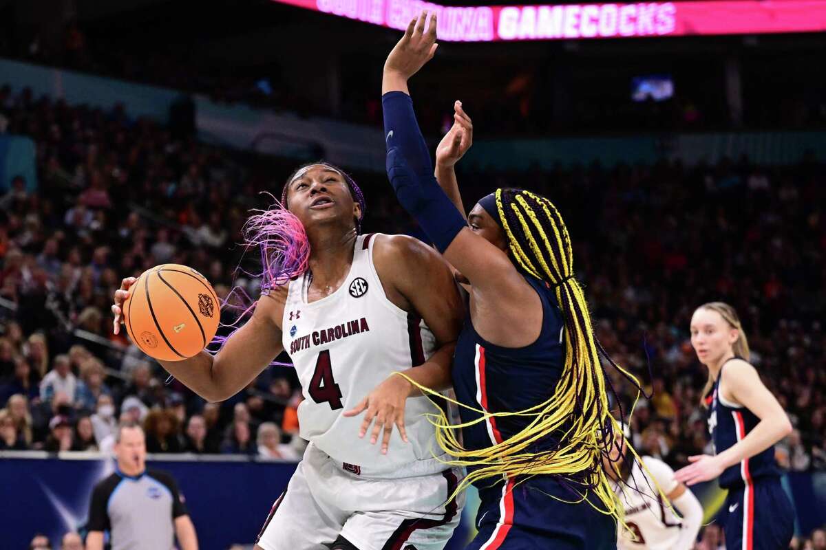 Aliyah Boston of the South Carolina Gamecocks drives against Aaliyah Edwards of the Connecticut Huskies during the championship game of the NCAA Women's Basketball Tournament at Target Center on April 3, 2022 in Minneapolis, Minnesota.?