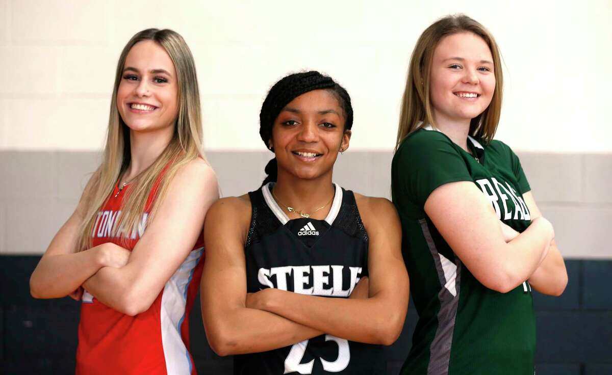 The three player of the year finalist are Antonian Carleigh Wenzel, Steele Sidney Love, and Reagan Samantha Wagner (L to R). Girls Basketball All-Area photo shoot at Steele HS on Wednesday April 6, 2022.