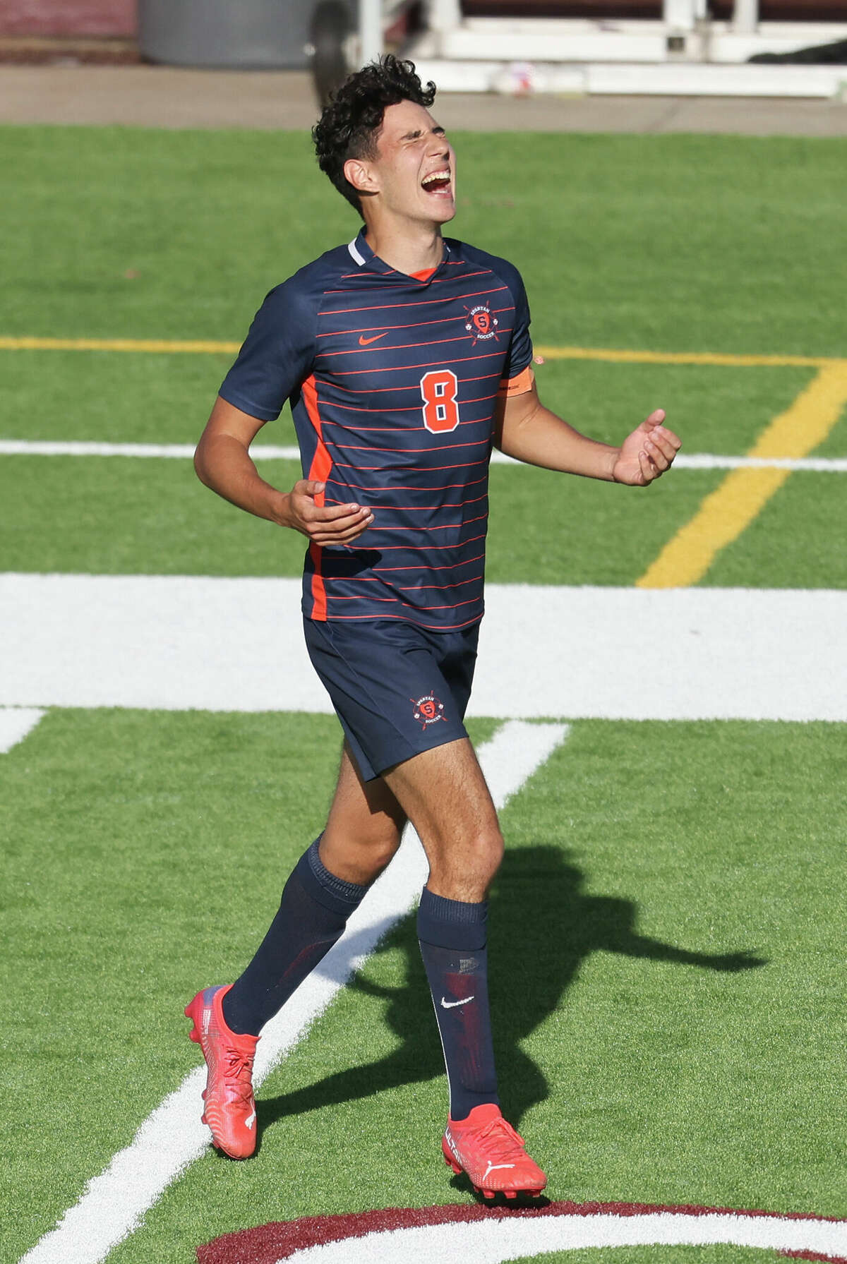 Seven Lakes Spartan Javier Rivas (8) celebrates scoring the game winning goal in overtime against the the Cypress Creek Cougars in a Region III-6A boys finals playoff soccer game on April 9, 2022 at Abshire Stadium in Deer Park, TX.