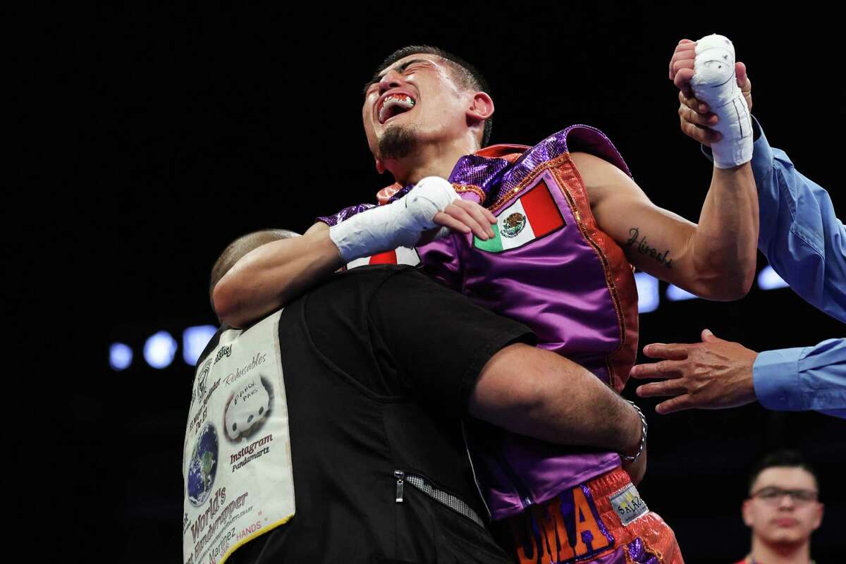 Katsuma Akitsugi reacts after defeating Gregorio Morales during their featherweight bout at the Alamodome on April 9, 2022 in San Antonio.