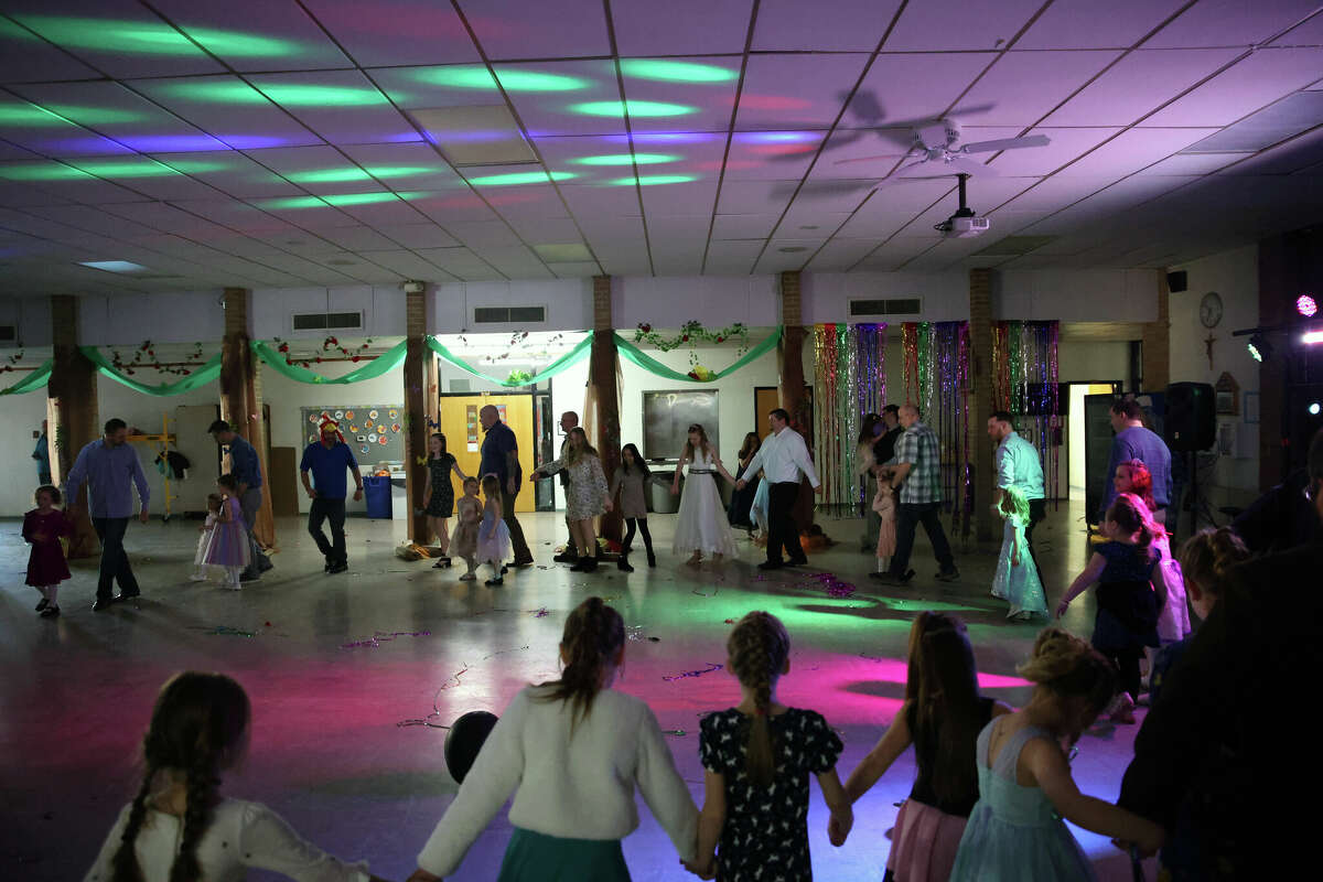 Fathers and daughters hit the dance floor for the Manistee Catholic Central School event, "dad daughter dancing" Saturday from 6 p.m. to 8 p.m.