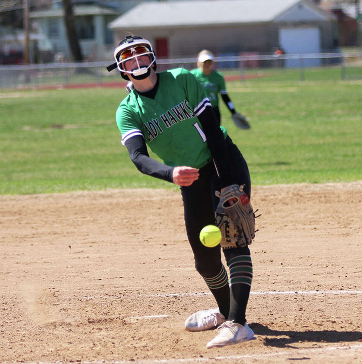 Carrollton freshman Lauren Flowers delivers to the plate in a game earlier this season at Wood River, struck out nine in a 2-1 loss to Calhoun on Saturday at the Beardstown Tourney.