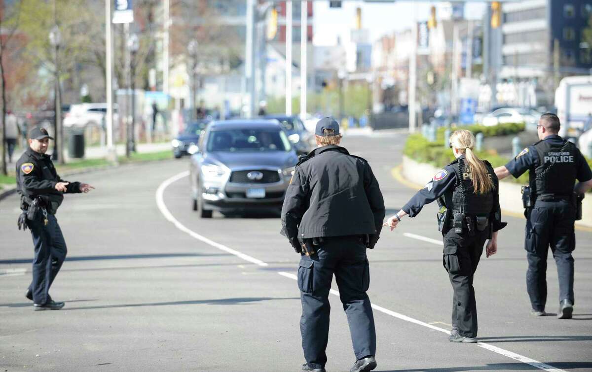 A team of city traffic officers were citing distracted drivers as part of a national U Drive, U Text, U Pay, high-visibility enforcement effort, on Washington Blvd. Tuesday, April 16, 2019 in Stamford, Connecticut. April is National Distracted Driving Awareness Month.