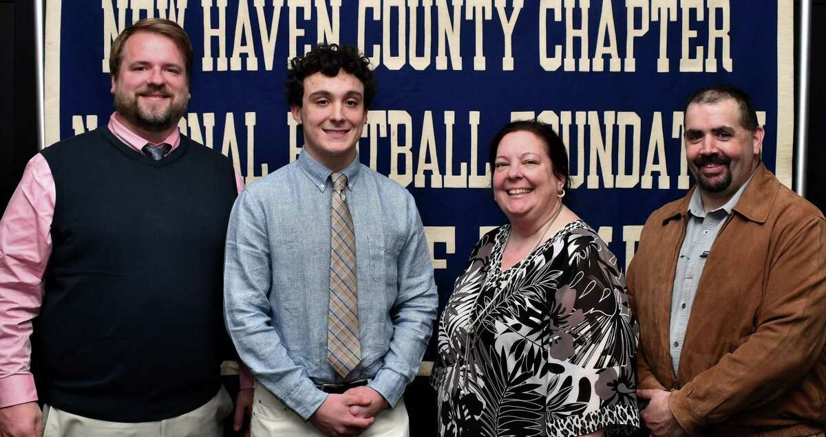 David Gaetano of Foran, with coach Tom Drew and parents Andrea and Dave, will be honored at the Casey-O'Brien Chapter of the National Football Foundation Scholar-Athlete dinner on April 26.