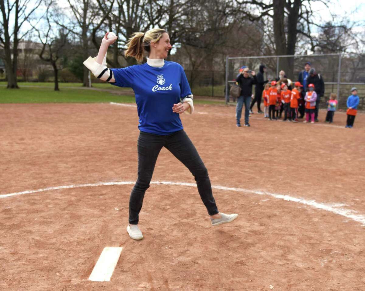 Stamford Mayor Caroline Simmons throws out the ceremonial first pitch on opening day of the Fairfield County Connecticut Jewish Baseball League at Scalzi Park in Stamford, Conn. Sunday, April 10, 2022. The Jewish baseball league for children age pre-K through grade six began its season on Sunday.
