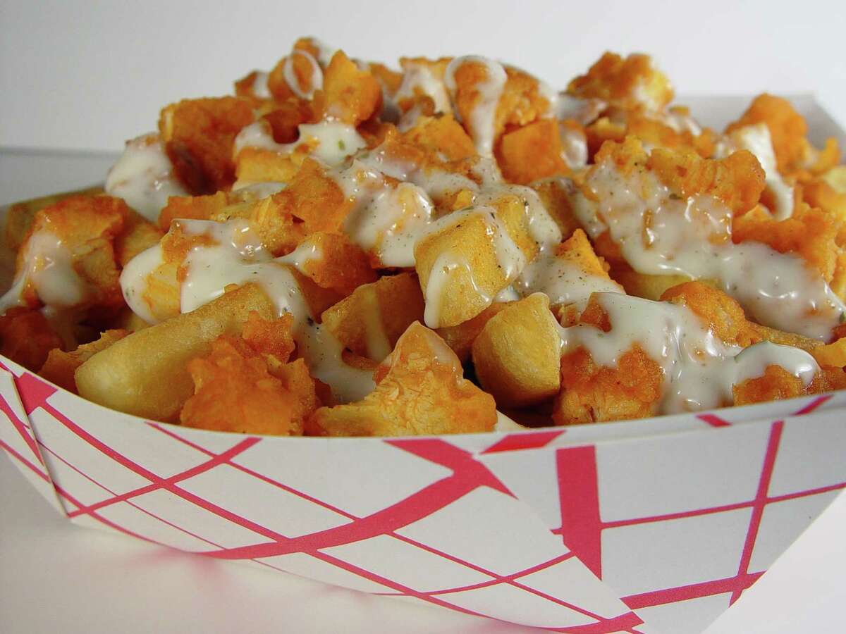 Buffalo Chicken Fries from Philly's -- A Taste of Philadelphia, which is about to open at 1008 in New Haven: French fries smothered in buffalo chicken and topped with ranch dressing.