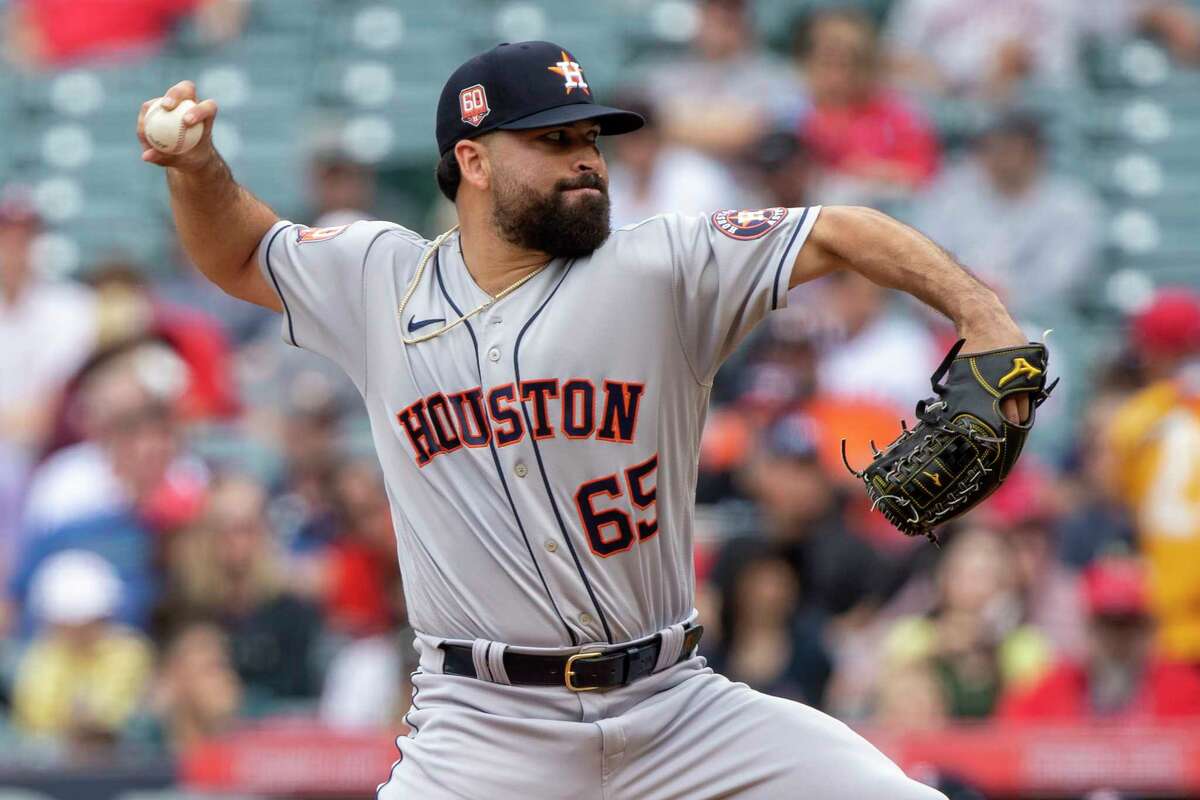 Houston Astros starting pitcher Jose Urquidy throws to a Los Angeles Angels batter during the first inning of a baseball game in Anaheim, Calif., Sunday, April 10, 2022. (AP Photo/Alex Gallardo)