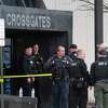 Members of law enforcement are seen outside of Crossgates Mall following a shooting that took place there on Sunday, April 10, 2022, in Guilderland, N.Y. (Paul Buckowski/Times Union)
