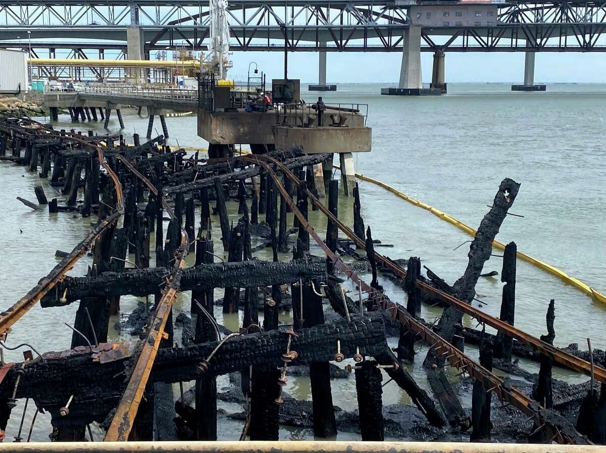 A fire’s rampage left charred infrastructure at the Amports docks in Benicia.