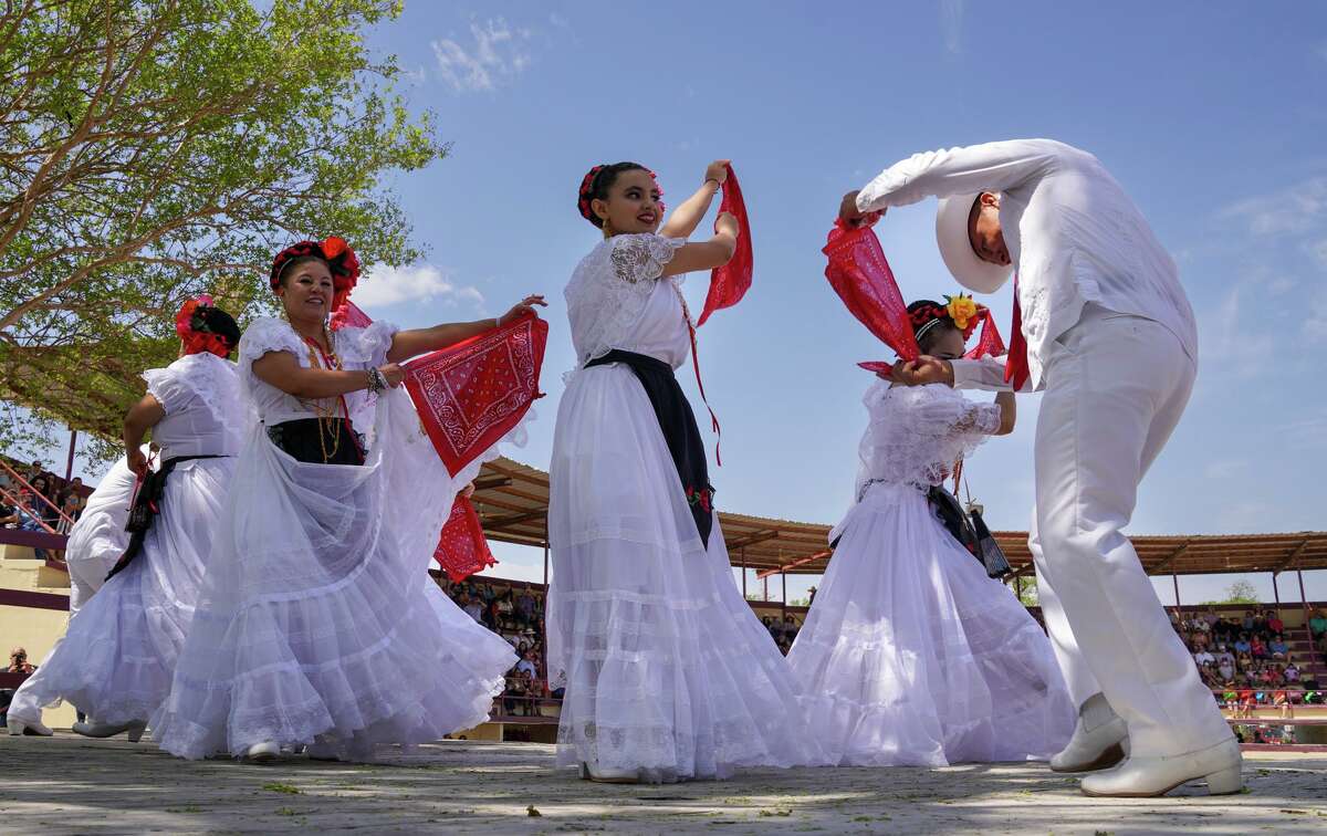 Dancers perform during "A Day in Old Mexico and Charreada" Sunday as part of the final day of Fiesta.