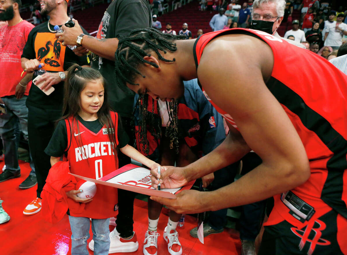 Rockets guard Josh Christopher, signing an autograph after the final game of the season, is part of a young group that could bring Houston back to the playoffs.