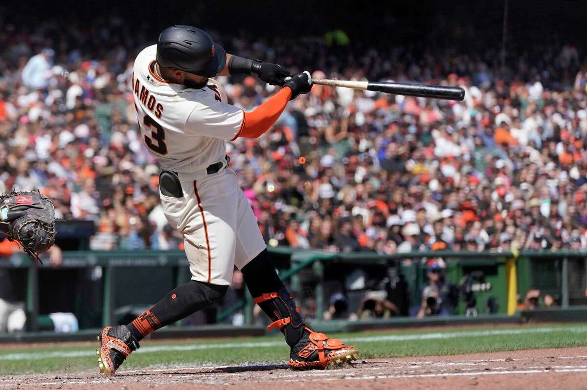 San Francisco Giants' Heliot Ramos hits a single against the Miami Marlins during the fourth inning of a baseball game in San Francisco, Sunday, April 10, 2022. (AP Photo/Jeff Chiu)