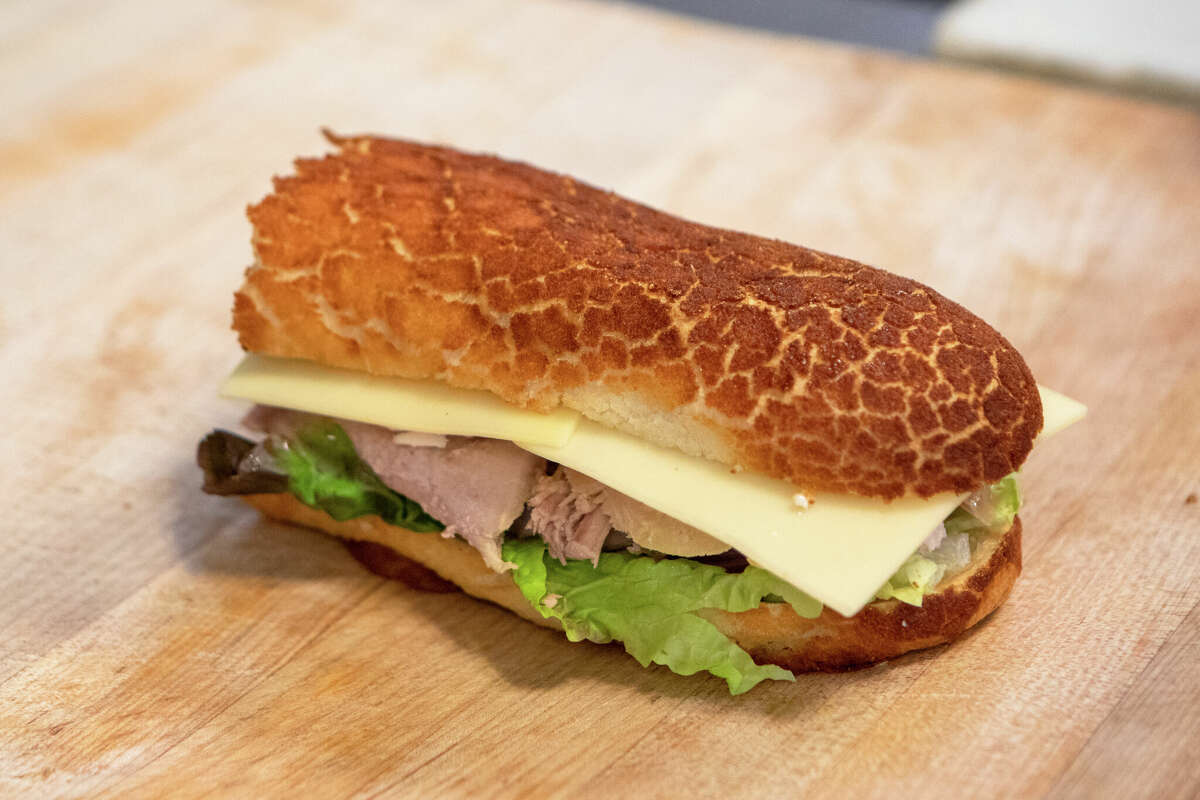 A hot roasted turkey sandwich on Dutch Crunch at Arguello Market in San Francisco on April 10, 2022. 