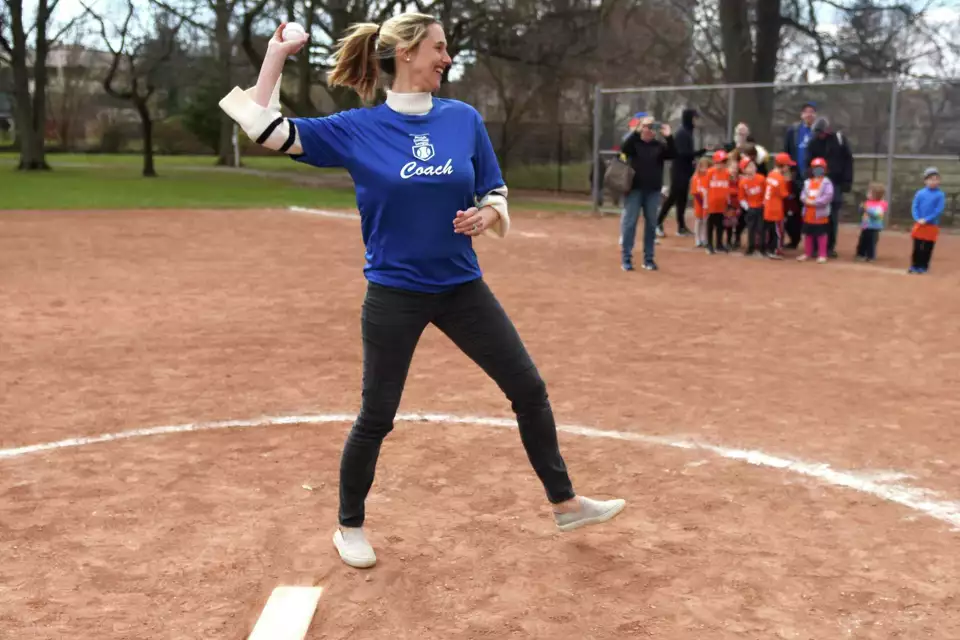 Stamford Mayor Caroline Simmons throws out the ceremonial first pitch on opening day of the Fairfield County Connecticut Jewish Baseball League at Scalzi Park in Stamford, Conn. Sunday, April 10, 2022. The Jewish baseball league for children age pre-K through grade six began its season on Sunday.