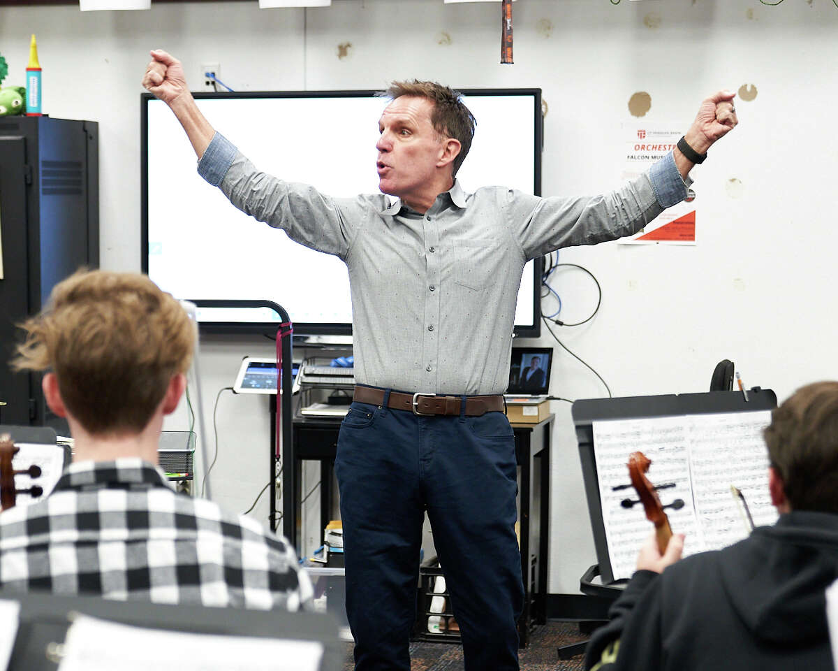 Midland-Odessa Symphony & Chorale Music Director and Conductor Gary Lewis hosted at Legacy High School to help orchestra students tune-up before their spring concert.
