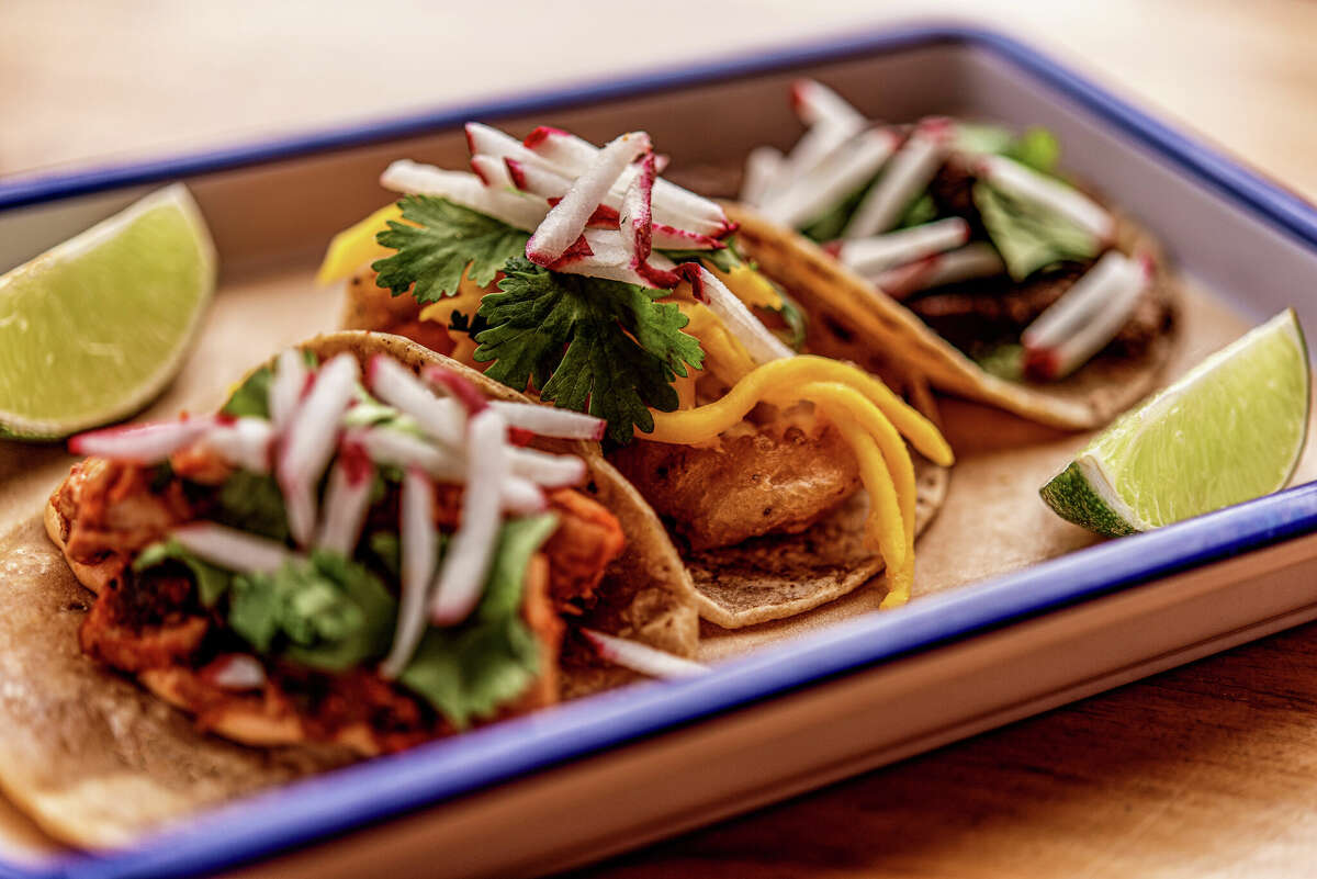 The Taco Project's menu features tacos with fillings like classic ground beef, free-range chicken, skirt steak, tempura-battered shrimp, and fish tacos with choice of sauteed or battered and fried cod.
