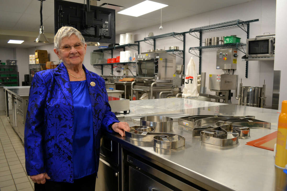 Joan R. Dembinski of Albany, who earned a culinary degree at SUNY Schenectady in 2010 after retiring from a 50-year career in pharmaceutical research, last week had the school's newest culinary lab named after her. She is shown in the Joan R. Dembinski ’10 Chocolate and Confections Lab, renamed in recognition of what the college called her "extraordinary support" of its foundation for scholarships and other programs.