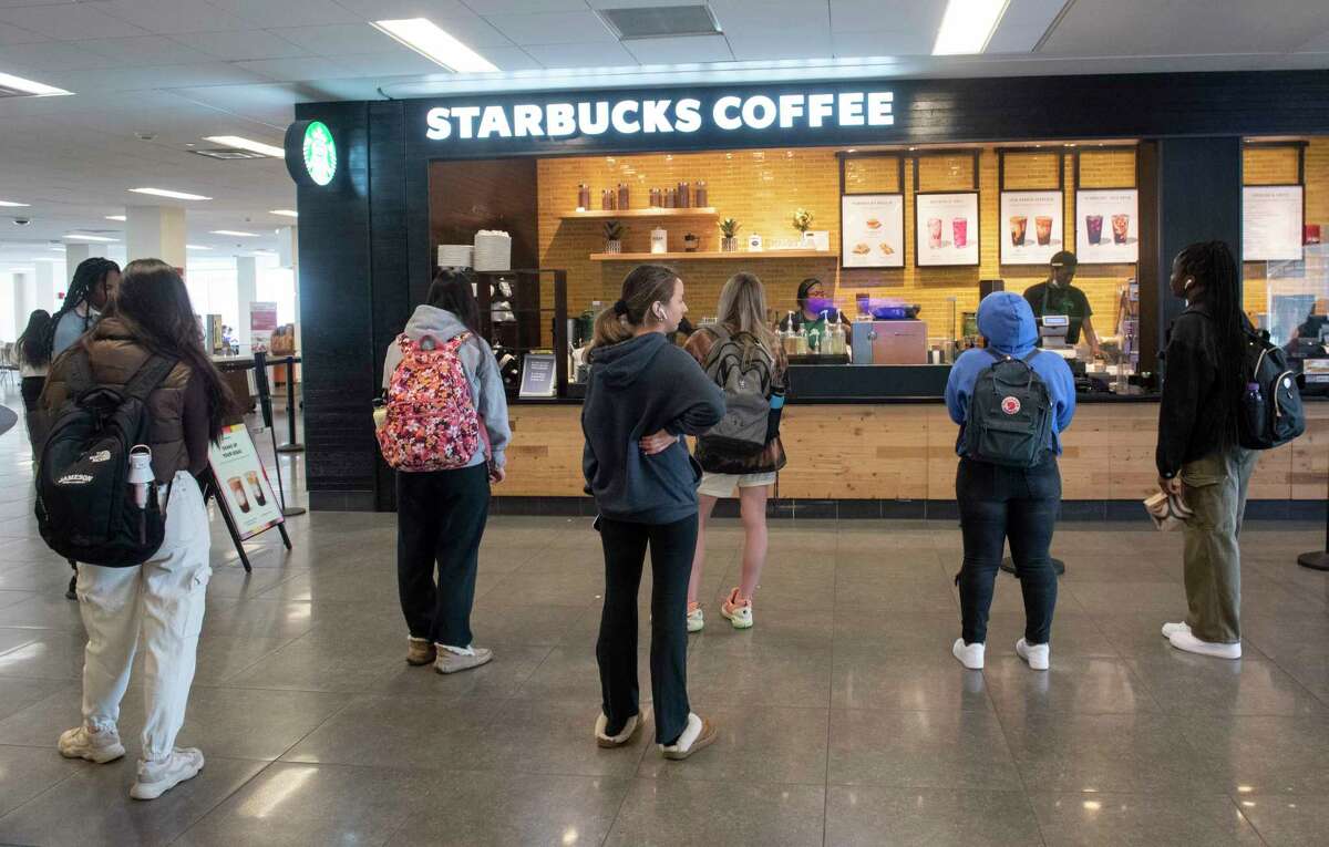 Student wait for their orders at Starbucks Coffee in the Campus Center at University at Albany on Friday, April 8, 2022 in Albany, N.Y.