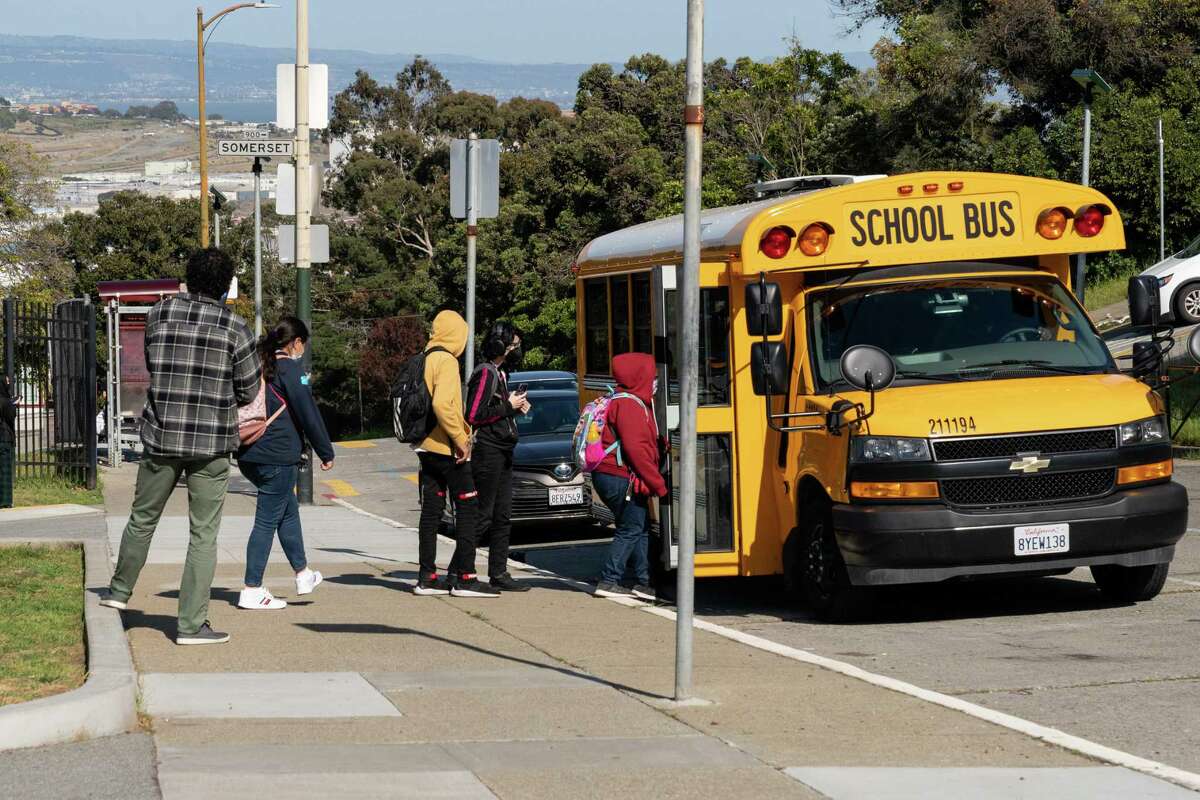 Students at San Francisco’s Burton High School get on the bus after school.