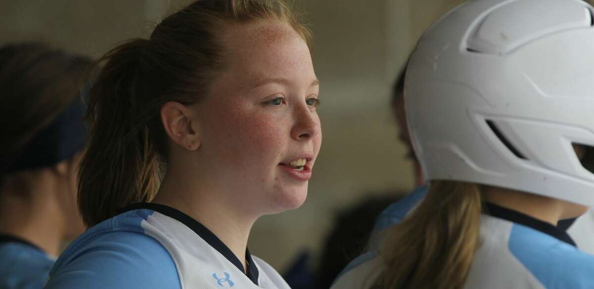 Triopia pitcher Jocelyn Bartels talks to a teammate in the dugout during a game earlier this season.