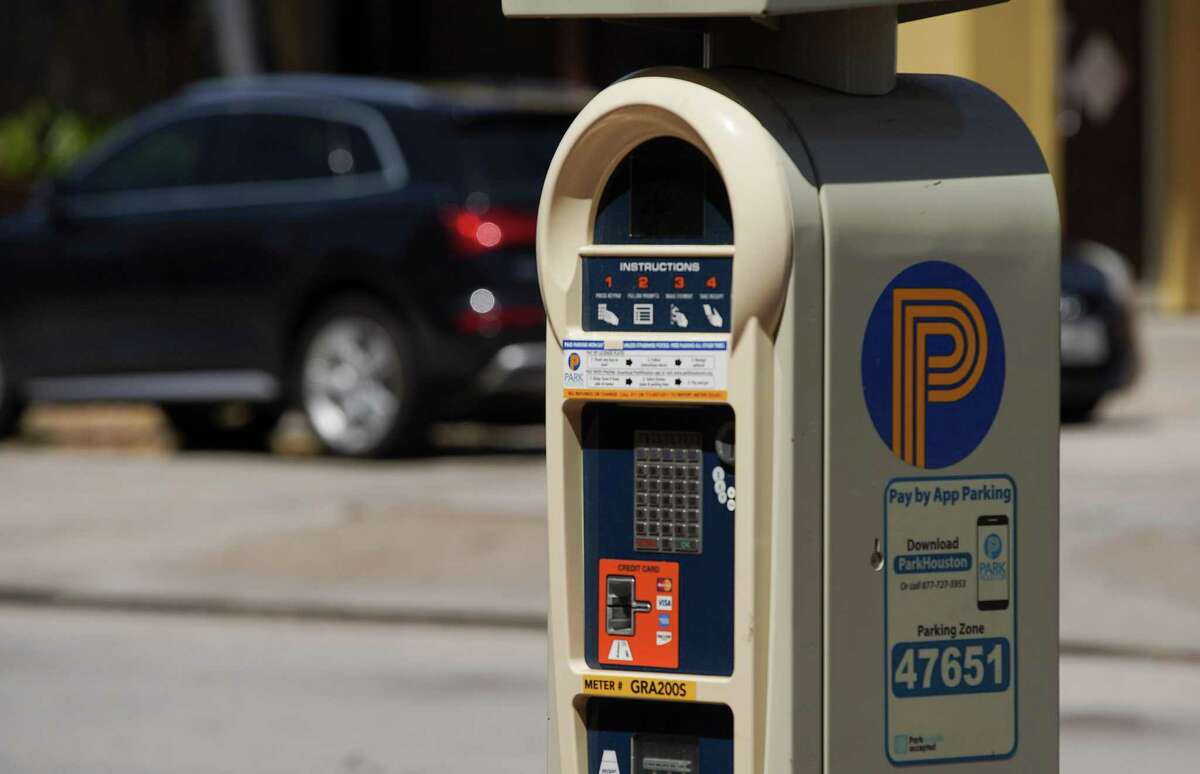 A car parked along Gray Street near Bagby in the Midtown area of Houston on March 30, 2022. City officials on April 5 approved a parking benefits district for Midtown, which allows the area to recoup some parking meter revenues for local improvements such as bike racks and landscaping for sidewalks. Meters in the area would operate beyond 6 p.m., and the Midtown area would keep 60 percent of the revenue collected after 6 p.m.