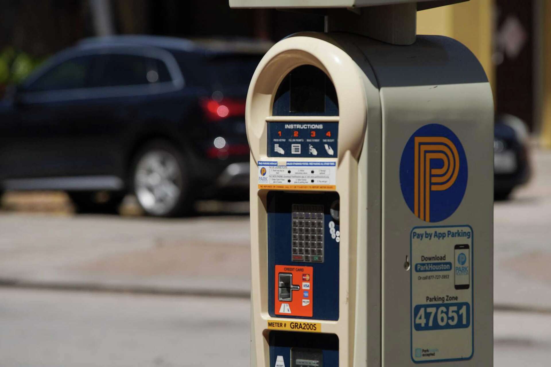 A car parked along Gray Street near Bagby in the Midtown area of Houston on March 30, 2022.