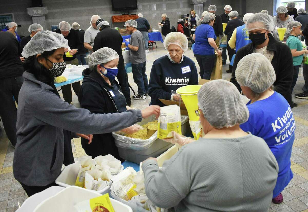 Ninety Kiwanis family members from across Connecticut came together April 2 in Middletown to package 27,000 meals for Connecticut families in need and 6,000 meals for those families impacted by the war in Ukraine