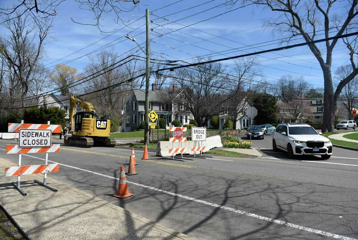 Traffic is detoured around the Sound Beach Avenue bridge in Old Greenwich, Conn. Monday, April 11, 2022. Starting Monday, construction to replace the bridge began with traffic detoured to Harding Road and Forest Avenue. Construction is expected to last until the first week of July.