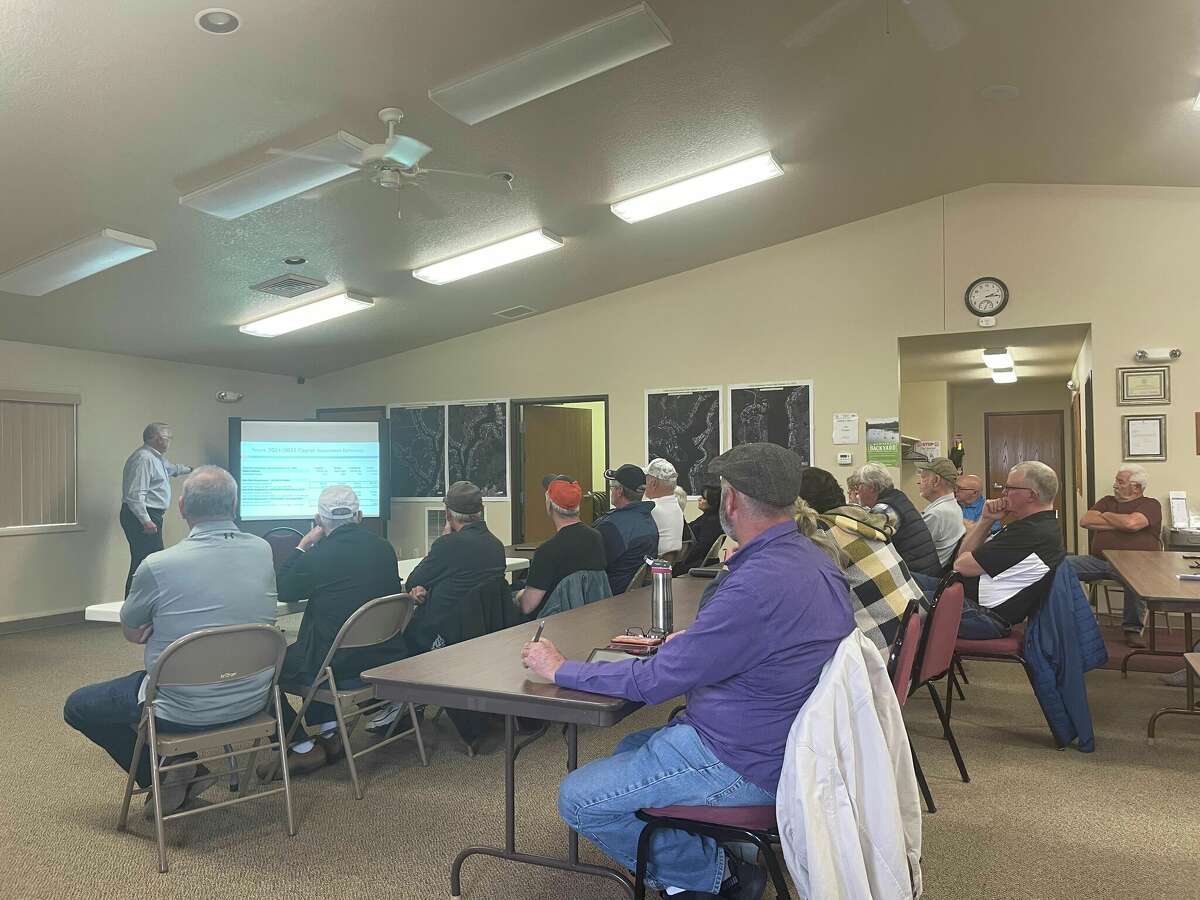 President Dave Kepler presents updates regarding the special assessment district to audience members in attendance at a Four Lakes Task Force board meeting on April 11, 2022 at Secord Township Hall. 