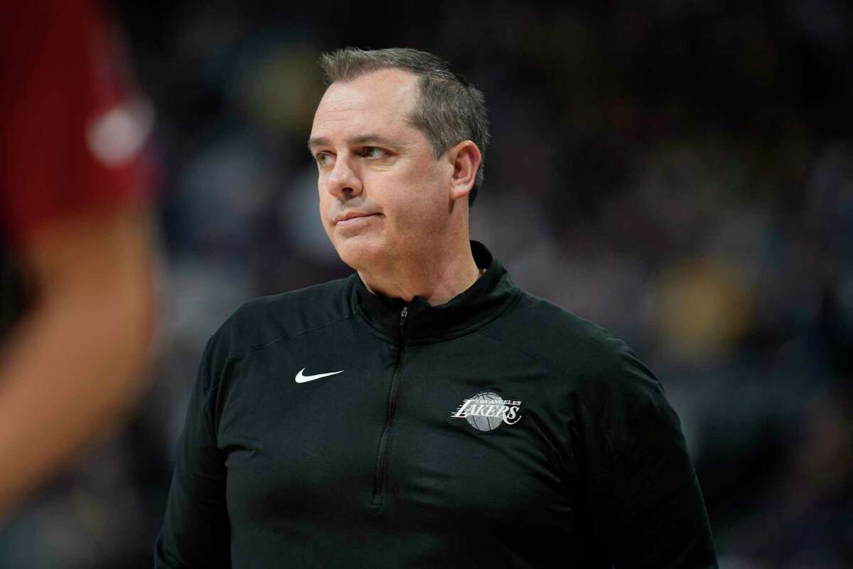 Los Angeles Lakers head coach Frank Vogel looks on in the first half of an basketball game against the Denver Nuggets Sunday, April 10, 2022, in Denver. (AP Photo/David Zalubowski)