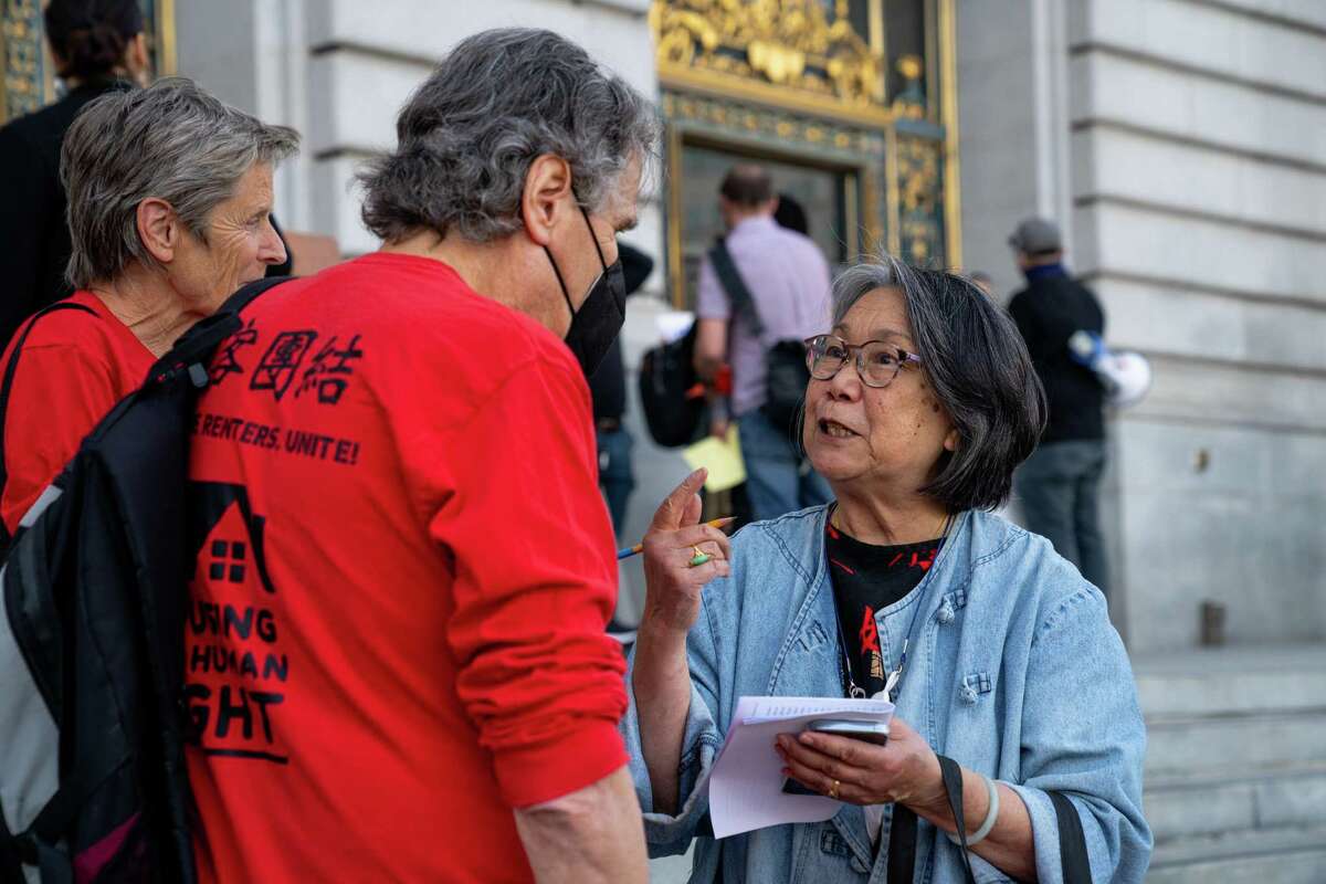 Demonstrators gather at San Francisco City Hall on April 6 to protest the plan for redrawing supervisorial districts.