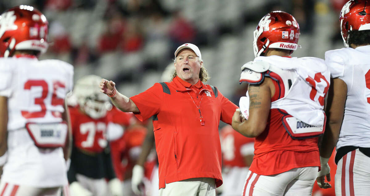 Houston Cougars head coach Dana Holgorsen gives directions to his team during spring practice at TDECU Stadium on Friday, April 8, 2022, in Houston.