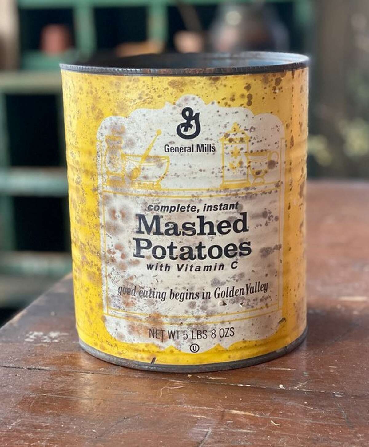 This vintage mashed potatoes tin is an example of merchandise sold at The Purple Ottoman in Bethalto.