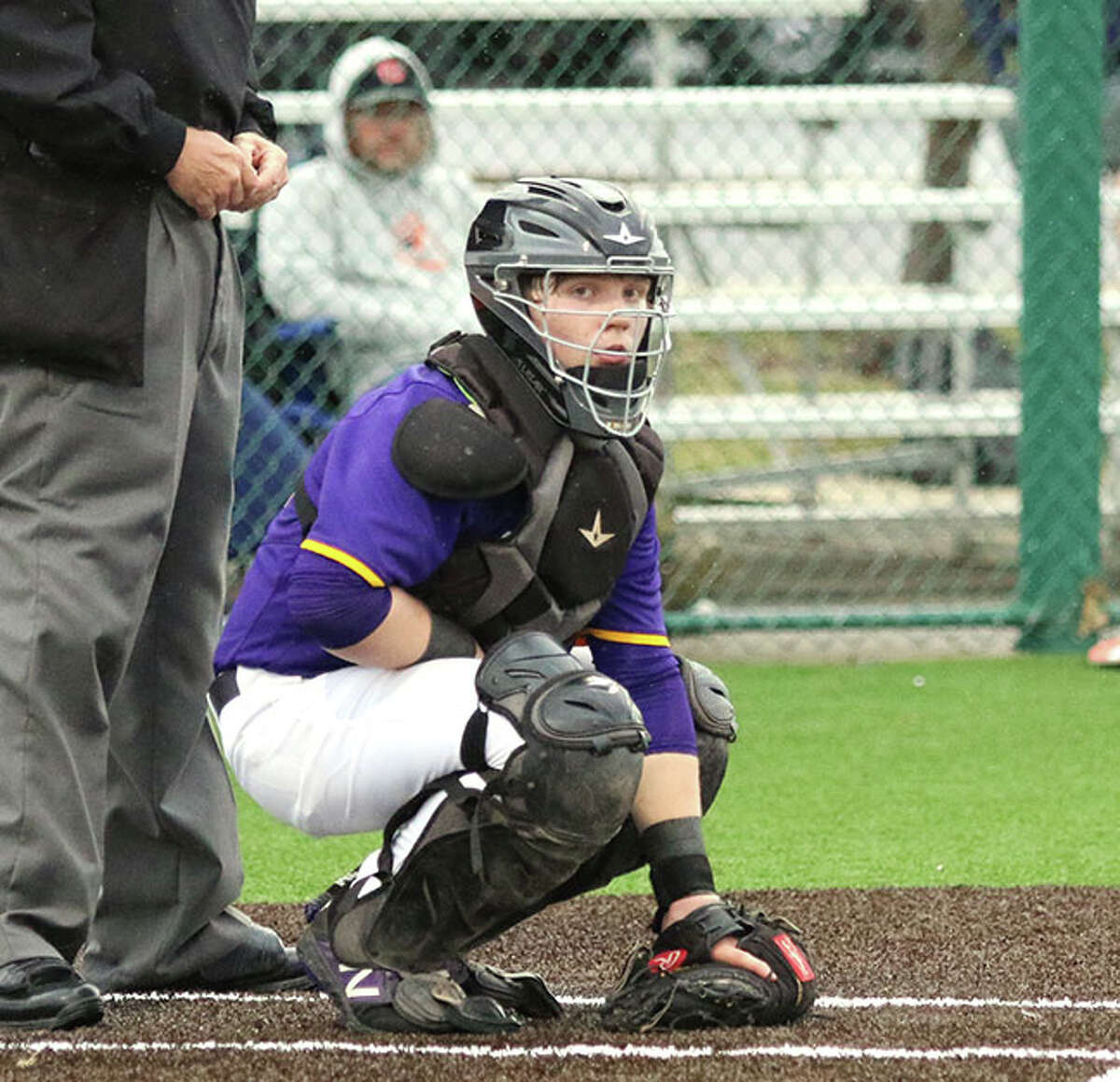 CM catcher Noah Petersen, looking to the dugout for a pitch call in a game earlier this season, had two hits and two RBI on Monday in the Eagles' MVC win over Jersey at the Bethalto Sports Complex.
