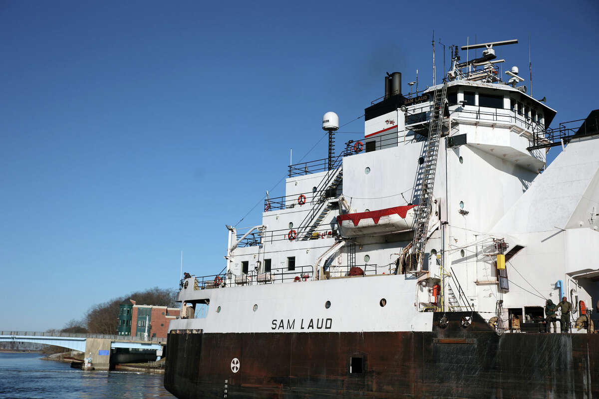 The first ship of the season, the Sam Laud, wades through the Manistee River Channel on Tuesday morning.