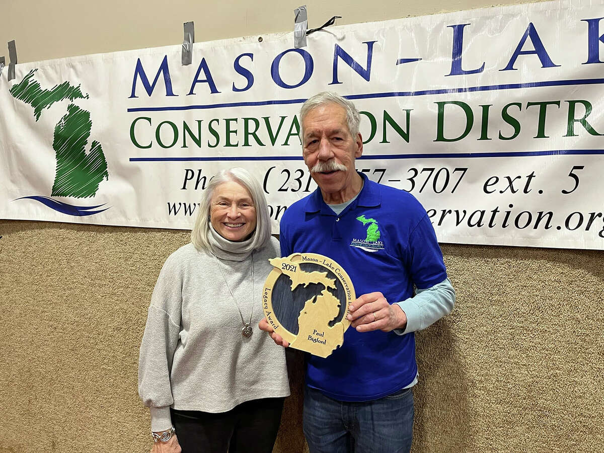 Pictured left to right, Maude and Paul Bigford, while Paul received a legacy award for the Mason/Lake Conservation District, which is rarely given out.