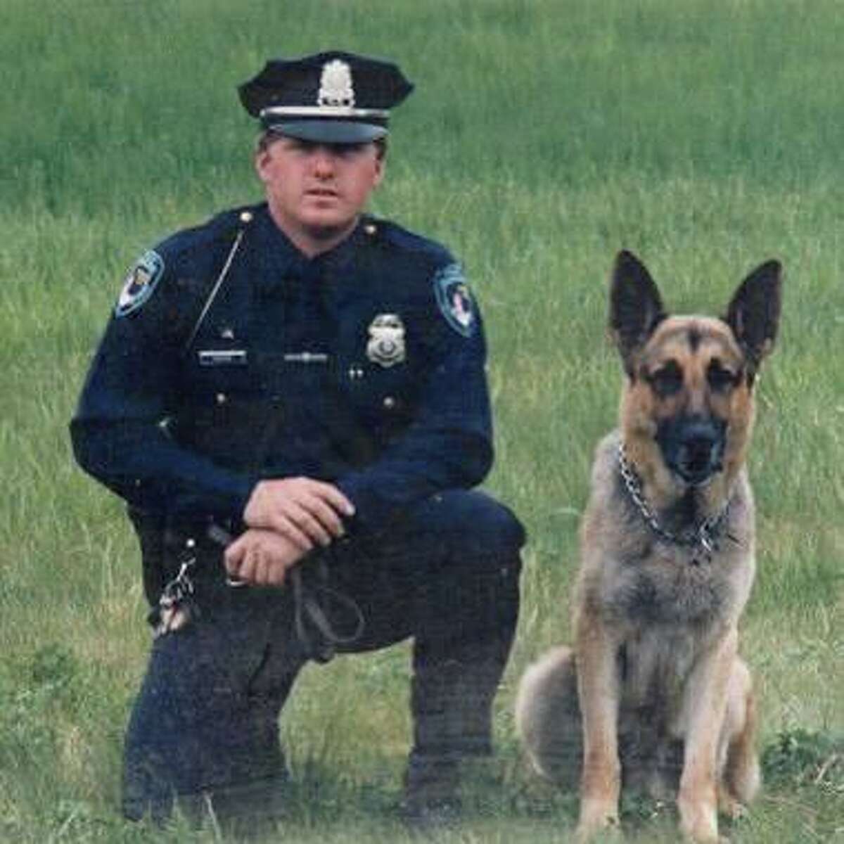 Officer Daniel Scott Wasson with his police dog partner General. The two served the Milford, Conn., community together prior to Wasson’s line-of-duty death on April 12, 1987.
