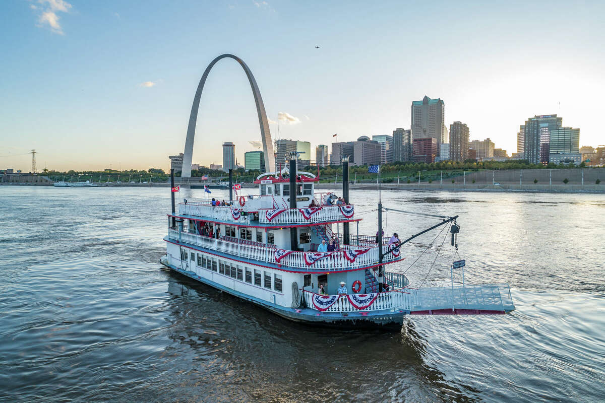 The Tom Sawyer riverboat cruises the Mississippi River on a sunny day in St. Louis. 
