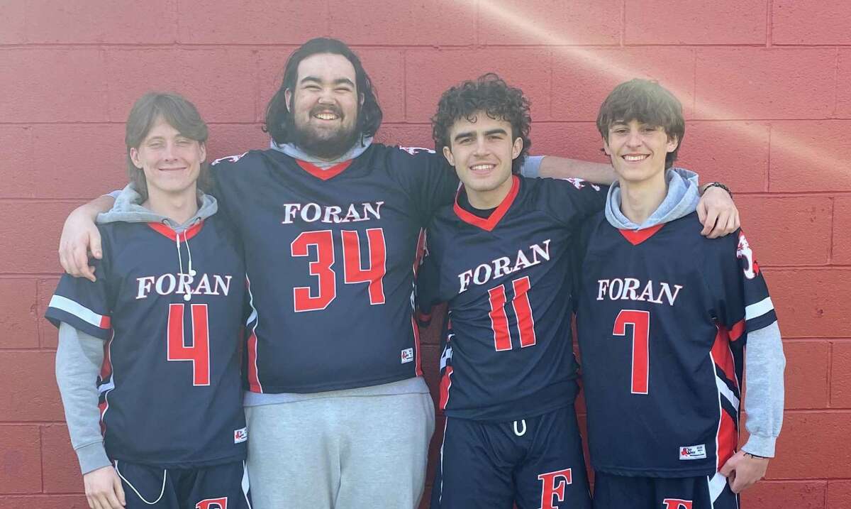 Andrew Kupson, Simon Collette, Luca Ubaldi and Joey Honcz captain Foran's boys lacrosse team.