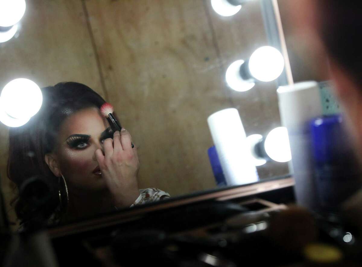 Tonica Cavalli, Miss Gay Texas USofA 2022, puts on her makeup before performing during the Miss Gay FLAS Trans-Center Texas USofA 2023 beauty pageant at Crystal Night Club in Houston on Sunday, April 10, 2022.
