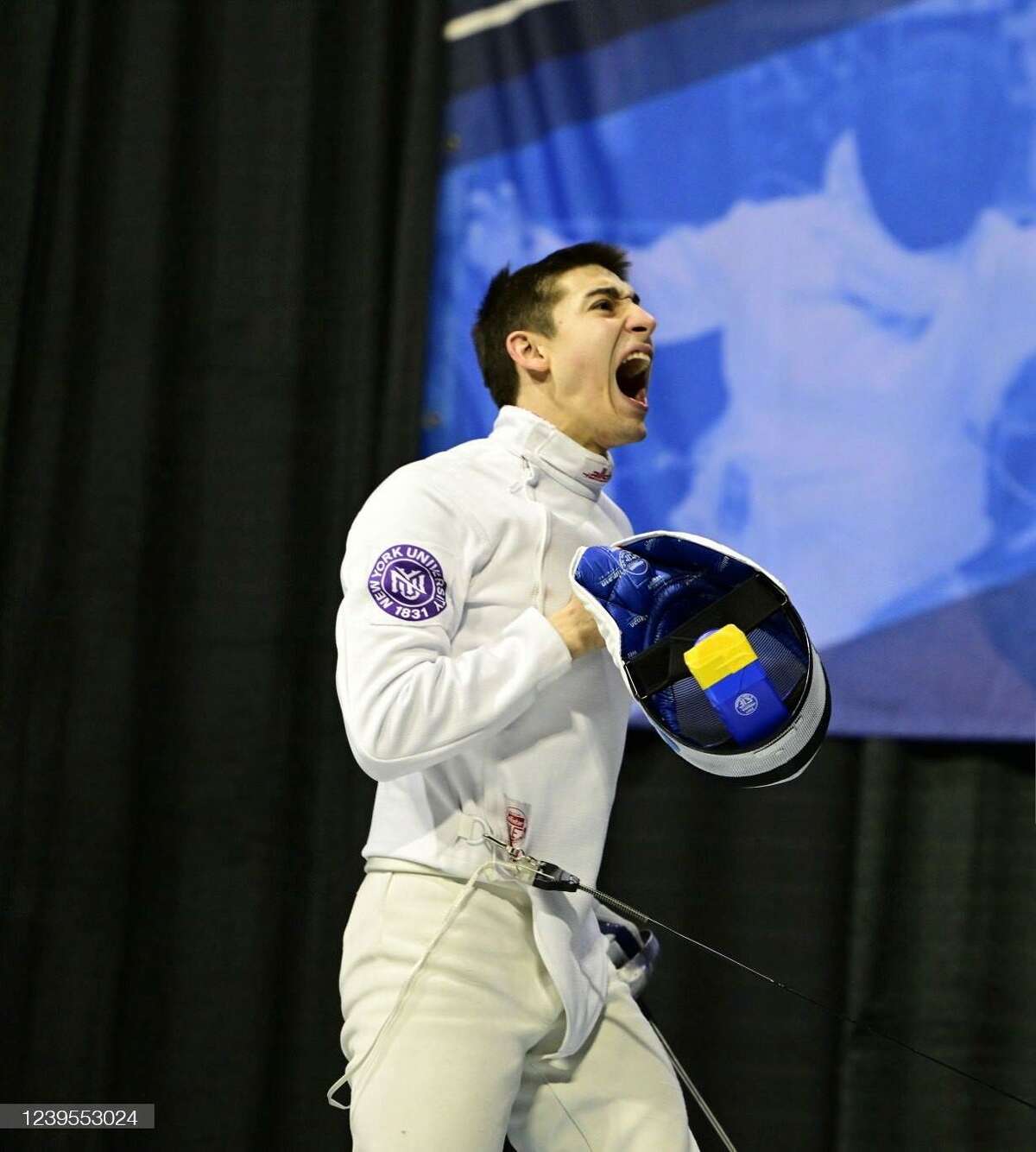 Ian Sanders showing emotion after securing a bronze medal at the 2022 NCAA Fencing Championships