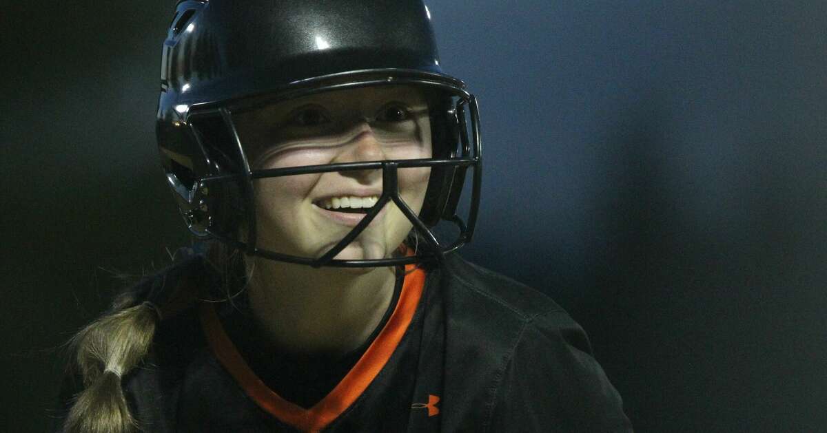 Action from the Beardstown softball team's win over Liberty in the fifth-place game of the Tiger Softball Showcase at Beardstown Saturday night.