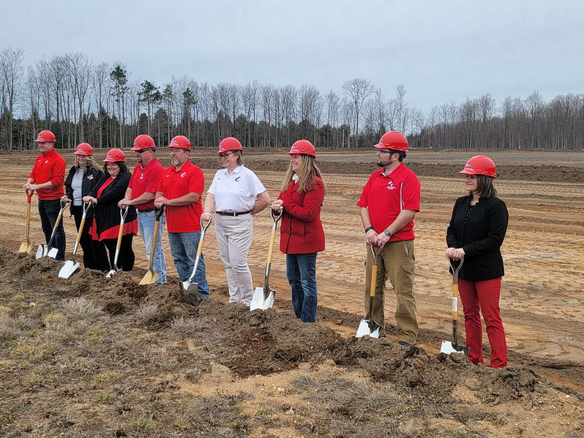 Benzie Central School Board of Education members and superintendent Amiee Erfourth get ready to dig in at the groundbreaking for Homestead Hills Elementary School. 