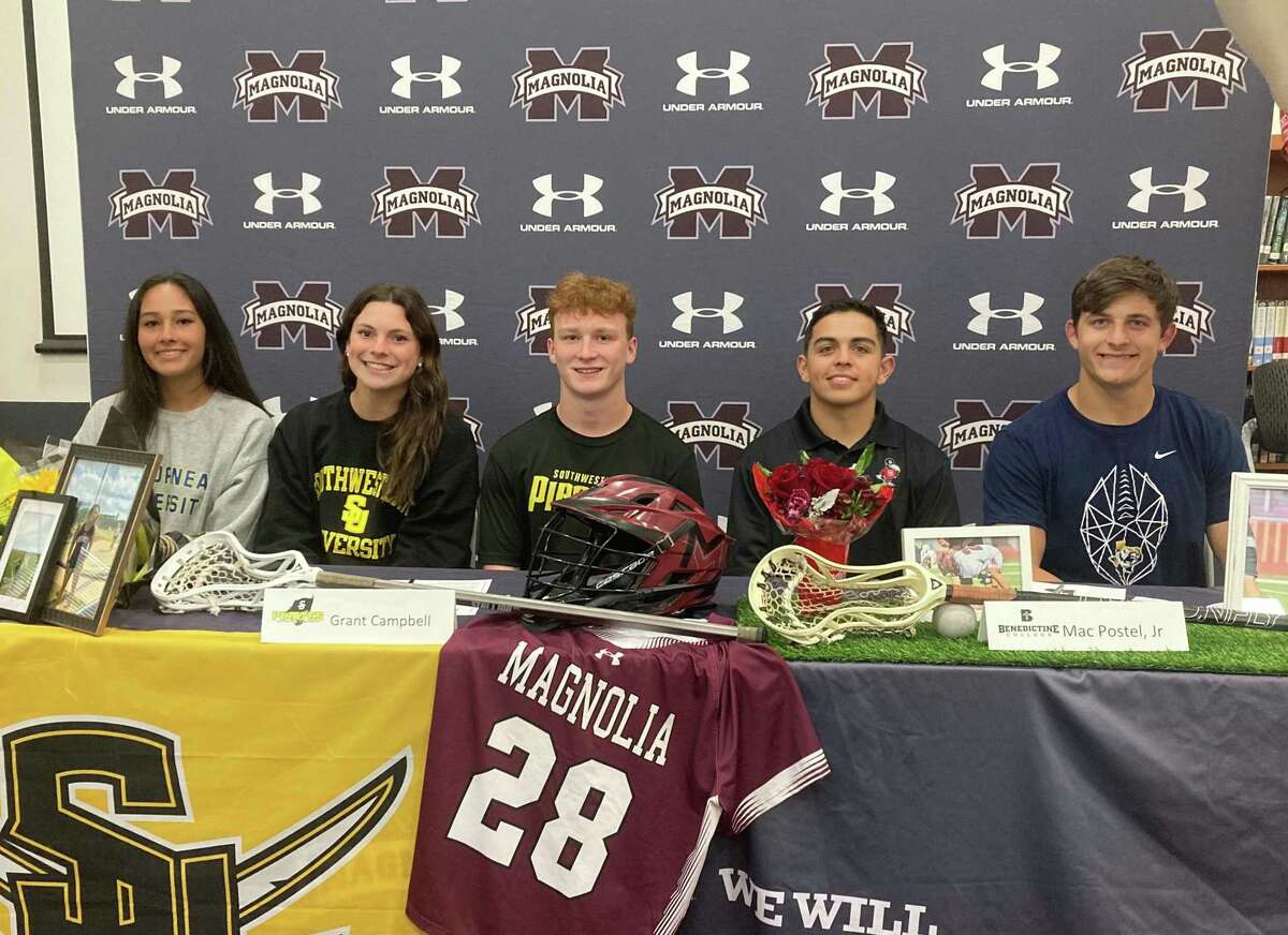Magnolia student-athletes (from left) Kelauna Cruz (soccer), Sydney Braun (track and field), Grant Campbell (lacrosse), Mac Postel Jr. (lacrosse) and Connor Jones (football) signed national letters of intent during a ceremony in the school library Tuesday, April 12, 2022 in Magnolia.