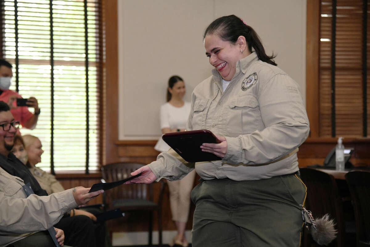 Susana Acosta received an award during a celebration of law enforcement telecommunicators for her efforts in helping EMS services reach an unresponsive woman in the outskirts of Laredo over the phone.