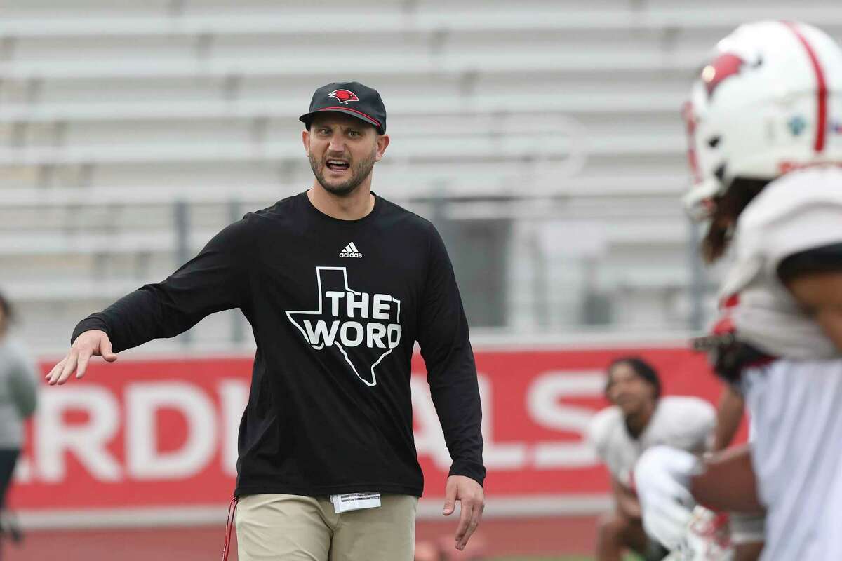 University of Incarnate Word Cardinals head coach G.J. Kinne works with the team during Spring football practice at Benson Stadium, Tuesday, April 12, 2022.