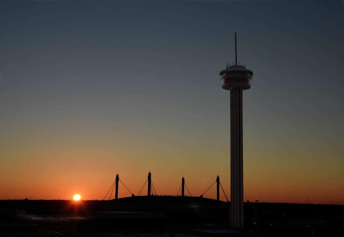 The sun rises behind the Tower of the Americas in San Antonio, Texas, a 750-foot observation tower-restaurant built for the 1968 World's Fair, known as HemisFair '68. 