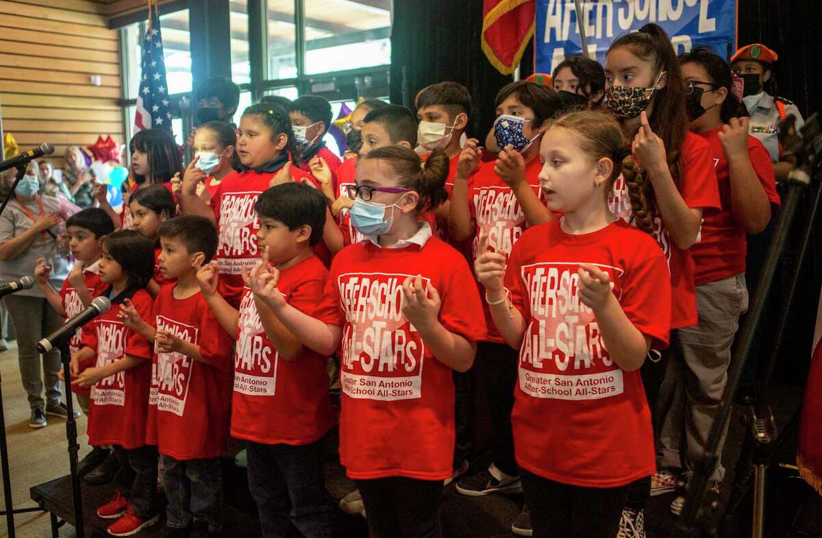 The Riverside Park Elementary School choir performs Tuesday at the Greater San Antonio After School All-Stars celebration luncheon held at the Briscoe Western Art Museum. The organization provides comprehensive after-school programs and summer sporting events for inner city youth.