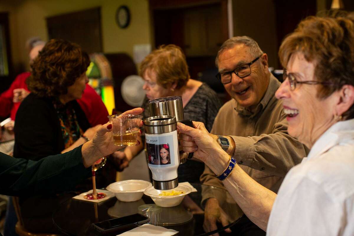 A toast during the weekly happy hour at the Army Residence Community on a recent Friday.